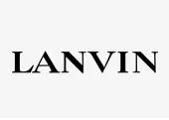 Paveikslėlyje pavaizduotas žodis LANVIN paryškintomis juodomis didžiosiomis raidėmis šviesiai pilkame fone.